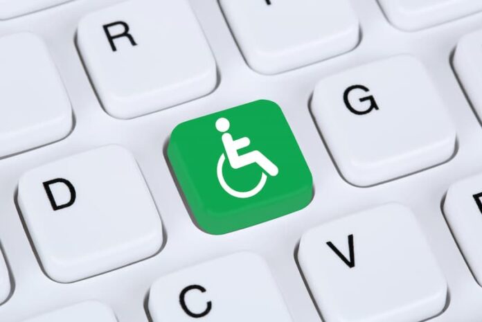 Ein Rollstuhlsymbol auf einer Tastatur, was ist barrierefreies Internet?