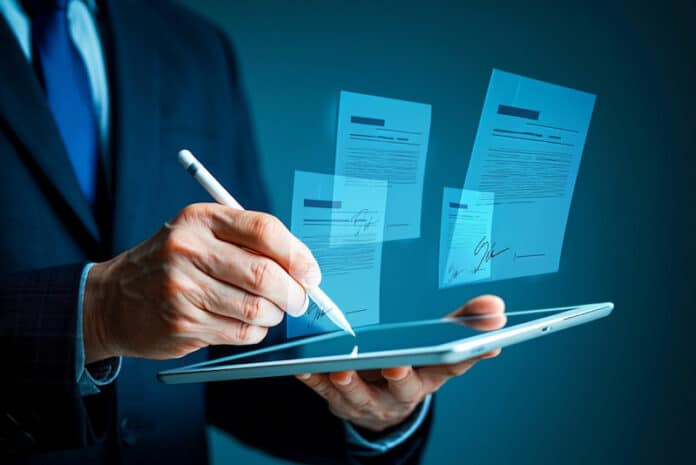 Geschäftsmann setzt seine digitale Unterschrift auf digitale Dokumente.